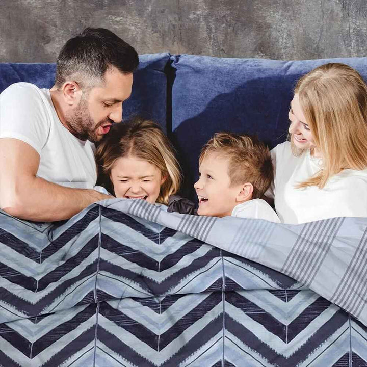 purple and white bedding set with patterns